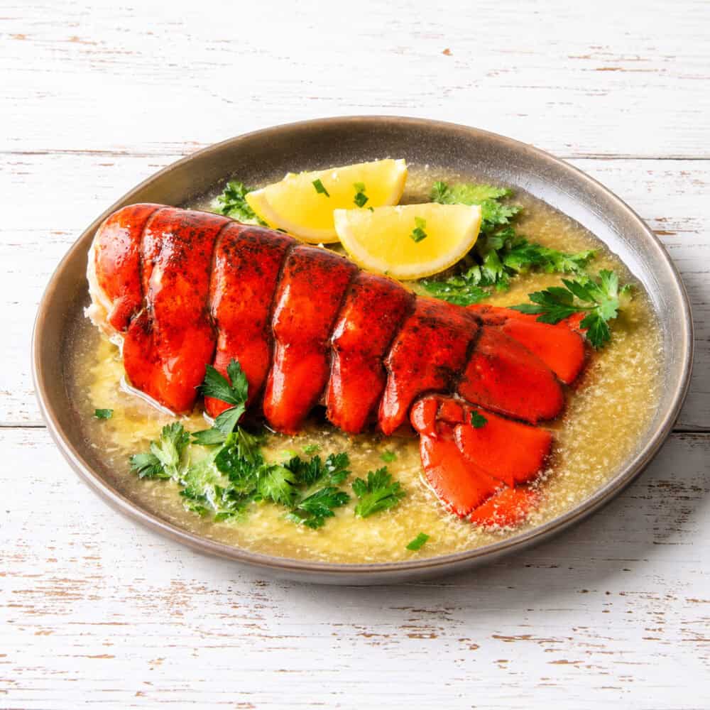 Cooked-20-oz-Monster-Tail-Lemon-Garlic Cooked 20–24 oz. Monster Lobster Tail