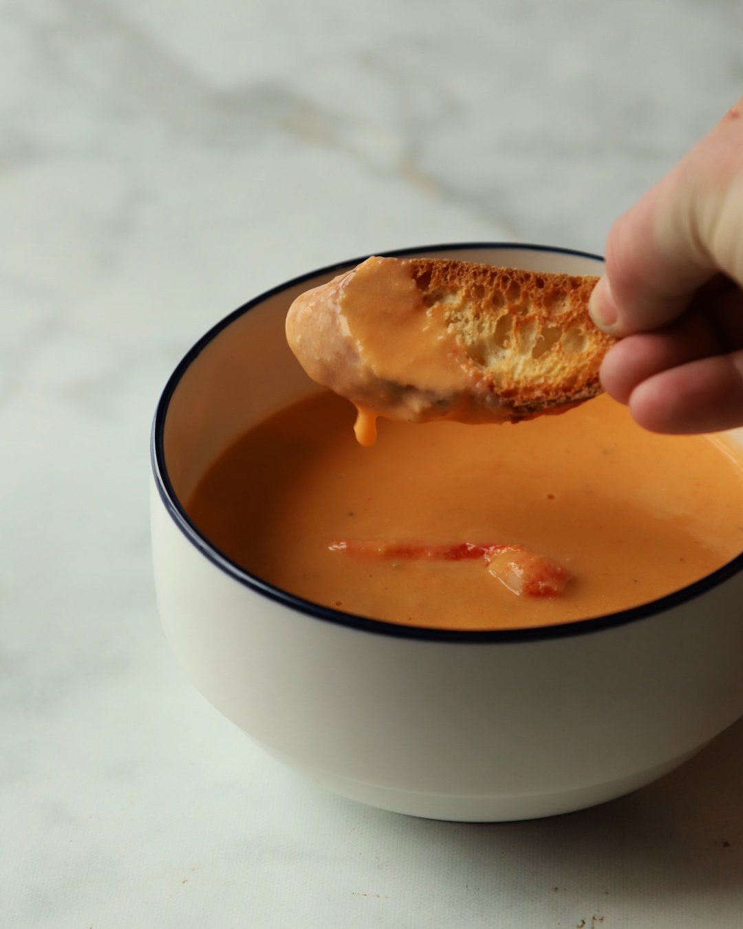 Bowl of creamy New England lobster chowder made with leftover lobster meat