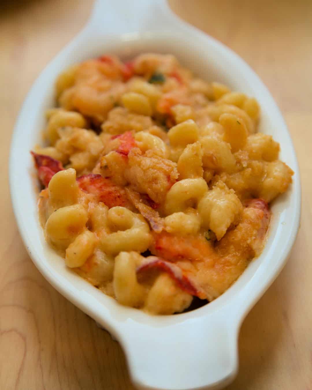 Baked lobster mac and cheese with chunks of tender lobster meat