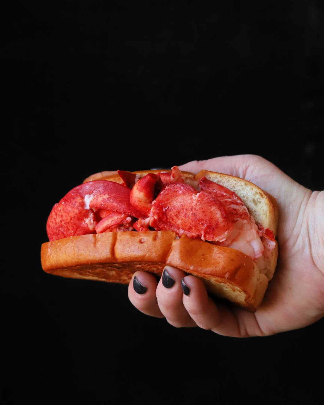 Maine-style lobster roll made with leftover lobster meat.